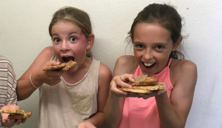 Playscheme children with their Scottish biscuits