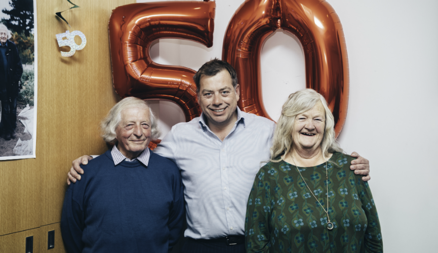 Lloyd and Grace pose for a photo with Co-op CEO Colin Macleod