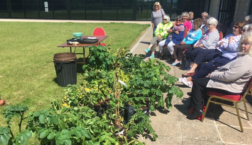 The WI Women await their potato 'weigh-in'