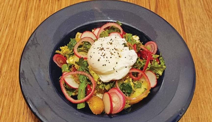 Jersey Royals, asparagus, pesto and goat's cheese salad with poached egg