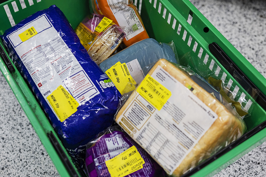 reduced loaves of bread in a green basket